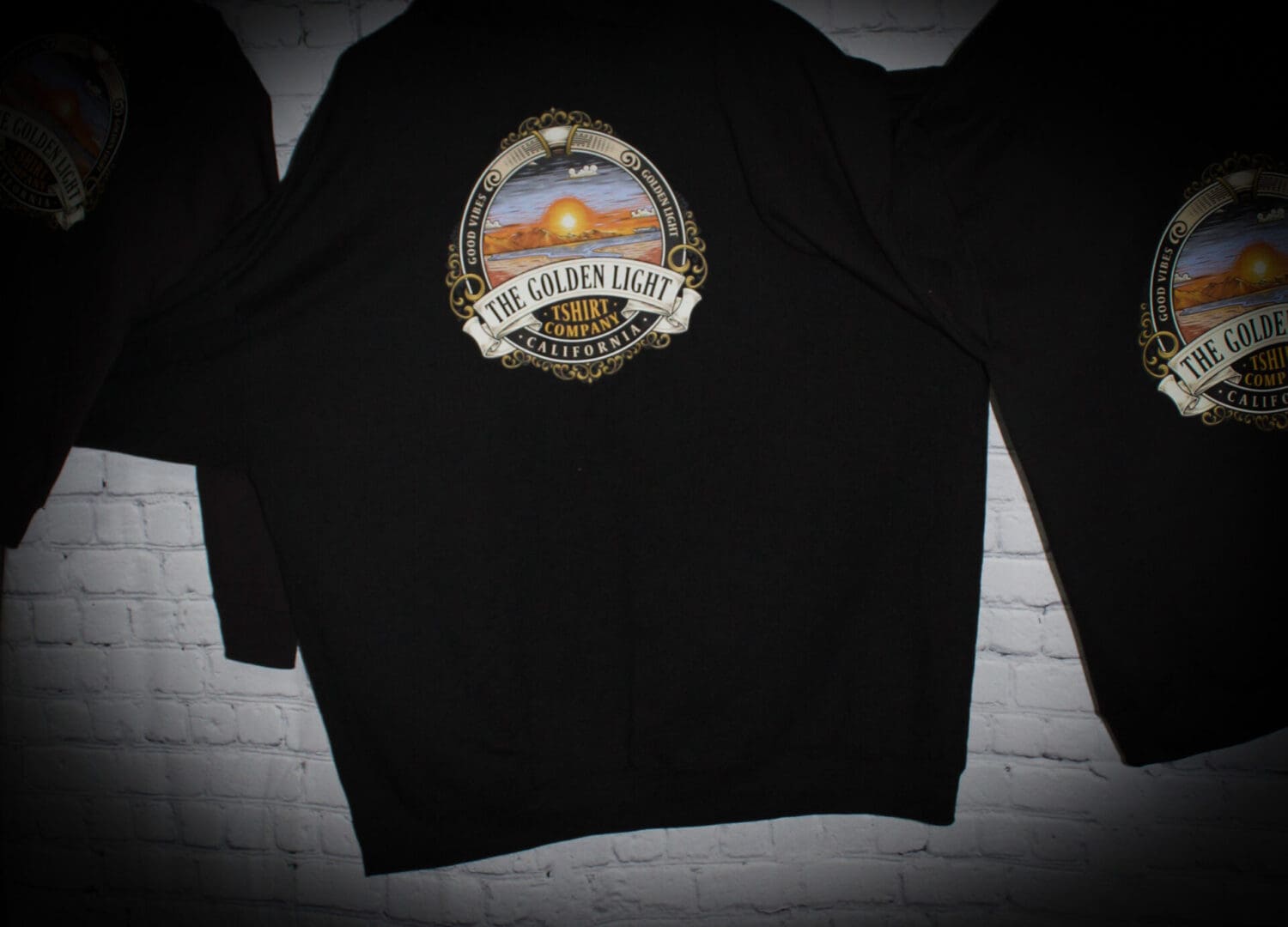 A black sweatshirt with an image of mountains.