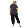 Woman in dark shirt and pants, back view.