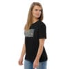 Woman in black t-shirt with art.