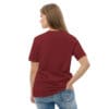 Woman in maroon t-shirt, back view.