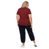Woman in maroon shirt and black pants, back view.