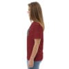 Woman in maroon t-shirt with art.