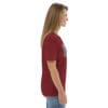 Woman in maroon t-shirt, side view.