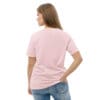Woman in pink t-shirt, back view.