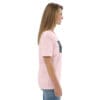 Woman in pink t-shirt with artwork.