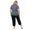 Woman in gray shirt and black pants.