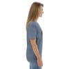 Woman in heather blue t-shirt, side view.