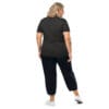 Woman in dark t-shirt and pants, back view.