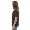 Woman in dark gray t-shirt, side view.