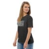 Woman in dark gray t-shirt with art.