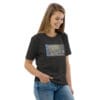 Woman in dark gray t-shirt with art.
