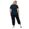Woman in dark blue t-shirt and pants.