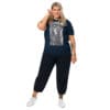 Plus-size model in navy graphic tee.