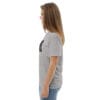 Woman in gray t-shirt with art.
