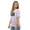 Woman in white T-shirt with art print.