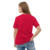 Woman in red t-shirt, back view.