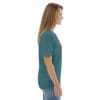 Woman in teal t-shirt with artwork.