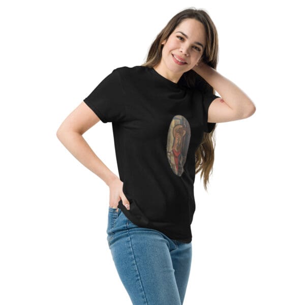 Woman in black t-shirt with art print.