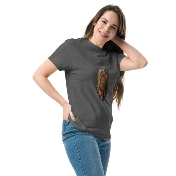 Woman in gray t-shirt with art print.