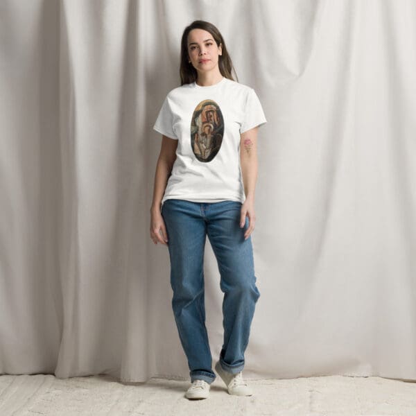 Woman in white t-shirt with religious art.