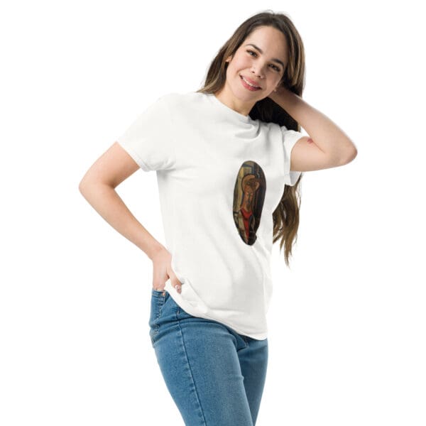 Woman in white shirt with artwork.