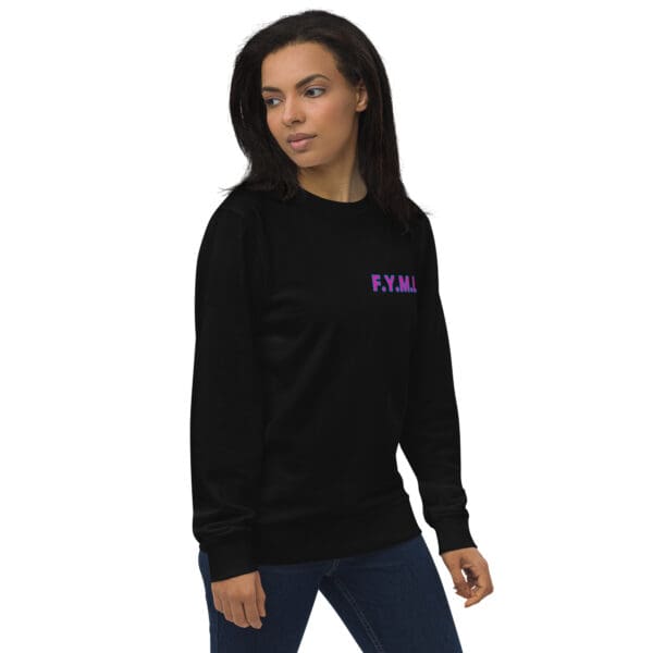 Woman in black sweatshirt, F.Y.M.I. logo.