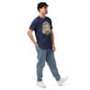Man in navy t-shirt with sunset logo.