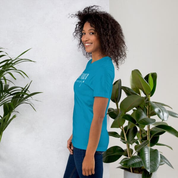 Woman in teal September tee shirt.