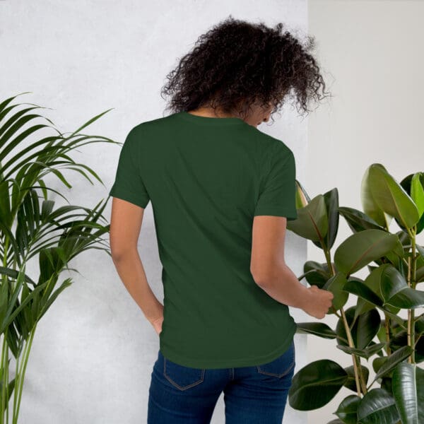 Woman in dark green t-shirt, back view.