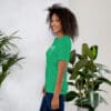 Woman in green September tee shirt.