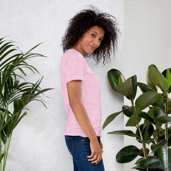 Woman in pink t-shirt, side profile.