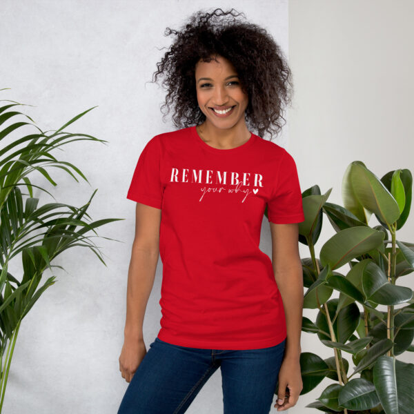 Here's an alt tag for the image: Woman in red "Remember your why" shirt.