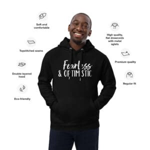 Man wearing "Fearless & Optimistic" black hoodie.