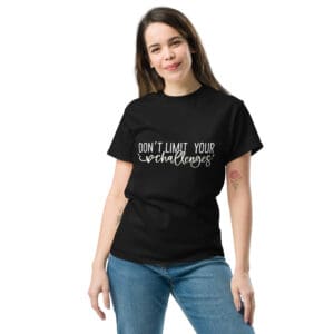 Woman wearing a black "Don't Limit Your Challenges" t-shirt.