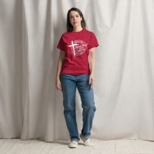 Woman in red t-shirt with motherhood message.