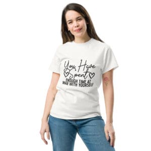 Woman wearing a motivational quote t-shirt.