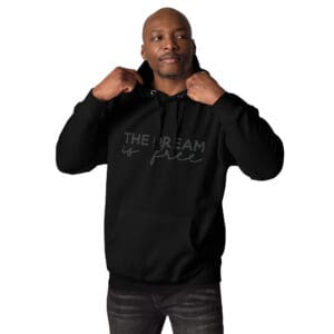 Man wearing black hoodie with text.