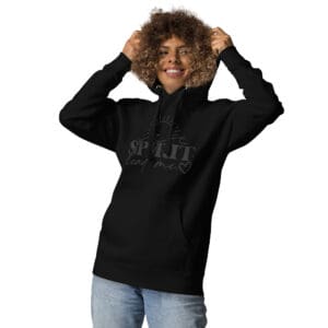 Smiling woman wearing a black hoodie.