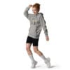 Person in grey hoodie and black shorts.