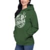 Woman wearing green hoodie with graphic design.