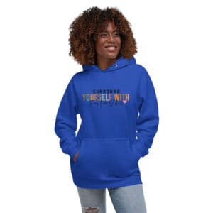 Person wearing a blue hoodie with text.
