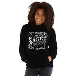 Smiling woman wearing black hoodie with witty graphic