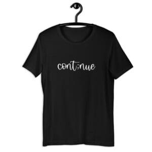 Black t-shirt with "continue" written on it.