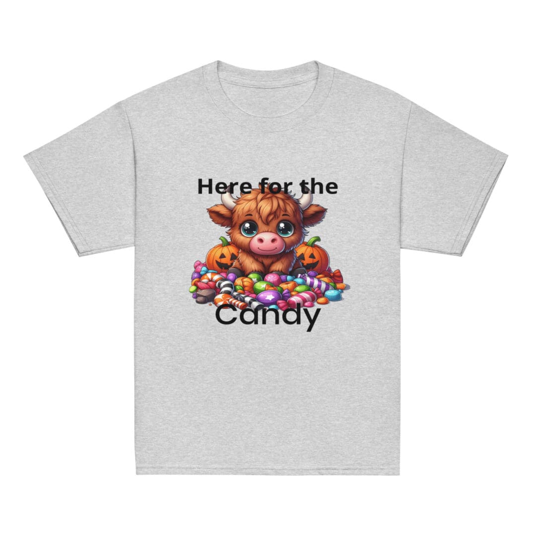 Cow with candy and pumpkins on T-shirt.