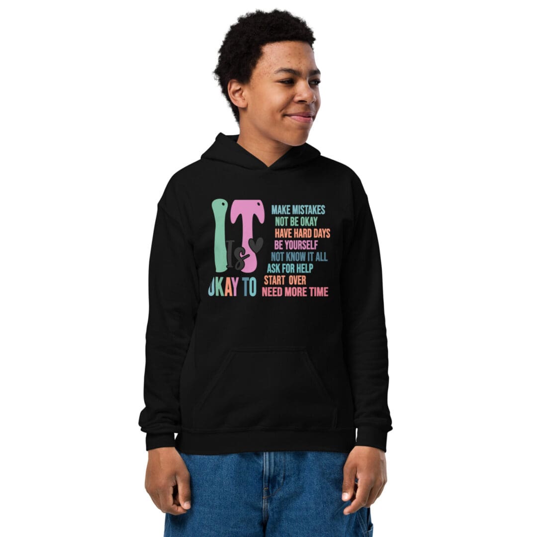 Person wearing a motivational message hoodie.